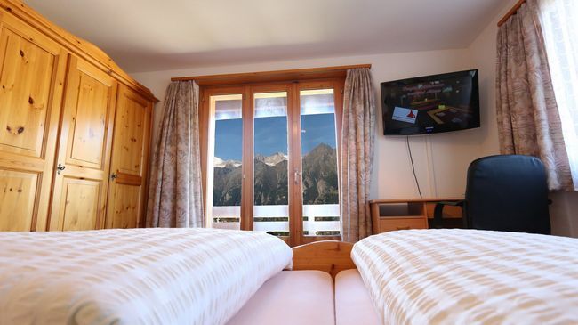 Hotel Alpina Grächen Szoba fotó